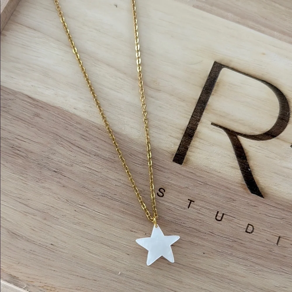 Gold Necklace with White Crescent Pendant